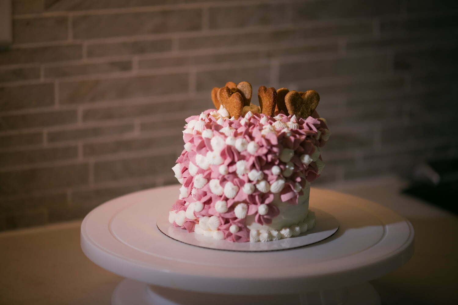 Floral cake with half bone hearts cookies